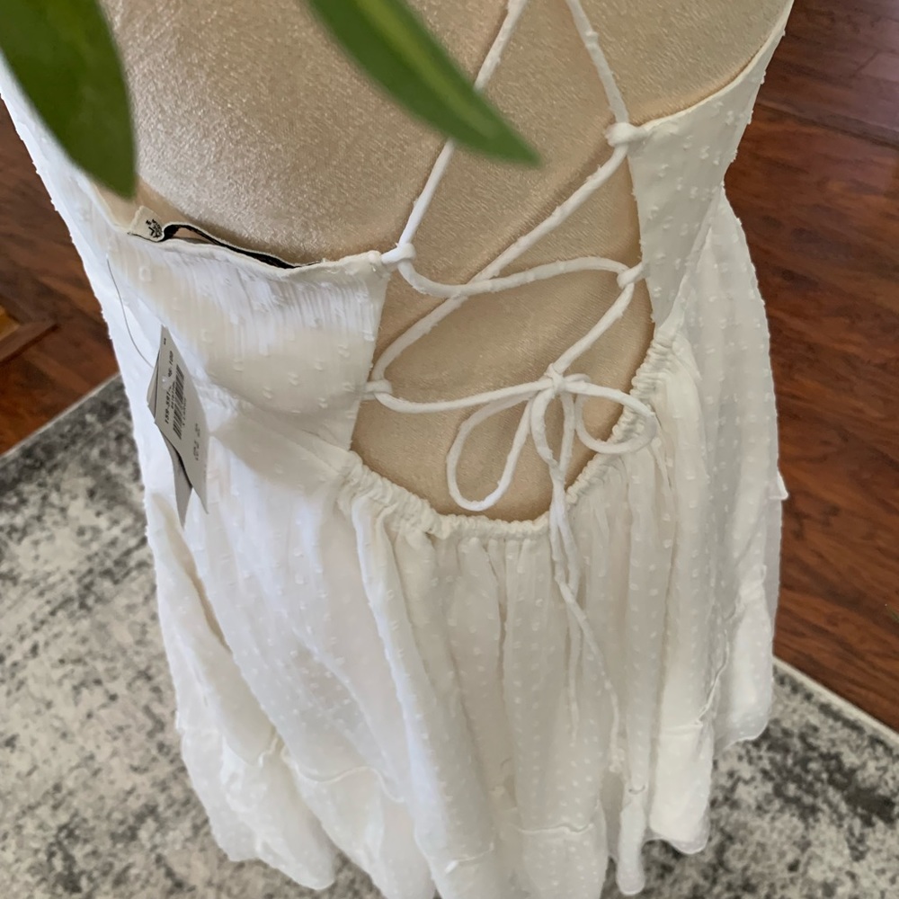 Abercrombie sundress. Adorable crisscross back in white with Swiss dot.